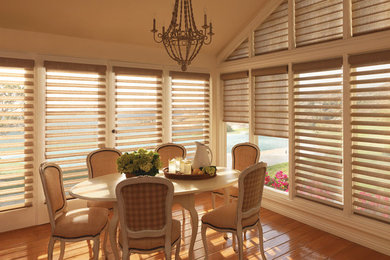 Example of a mid-sized beach style vinyl floor kitchen/dining room combo design in Other with beige walls and no fireplace