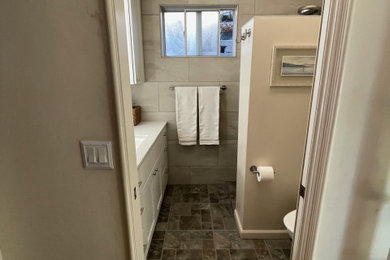 Example of a small trendy porcelain tile, gray floor and single-sink bathroom design in San Diego with a drop-in sink, marble countertops and a built-in vanity