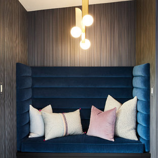 Design ideas for a modern study in San Francisco with black walls, porcelain flooring and black floors.