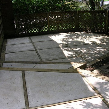 Retaining Walls, Concrete Patio, Brick Walkway and Steps