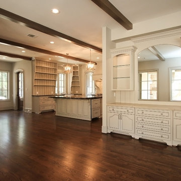 Combining Stucco and Stone bring charm to this Country French