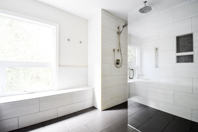Large trendy master white tile and ceramic tile ceramic tile, gray floor and double-sink bathroom photo in Portland with recessed-panel cabinets, white cabinets, a two-piece toilet, white walls, an undermount sink, quartz countertops, a hinged shower door, beige countertops and a built-in vanity