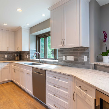 Modern Gray and White Kitchen with Peninsula Seating for 4
