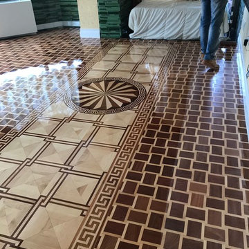 Decorative border frames the flooring much like a picture frame