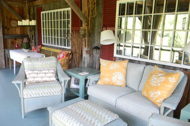 This is an example of a farmhouse porch design in Manchester.