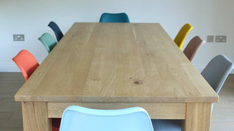 8ft Solid oak table with multi-coloured chairs
