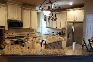 After: Spanish Glazed Kitchen Cabinets with added crown and rope trim