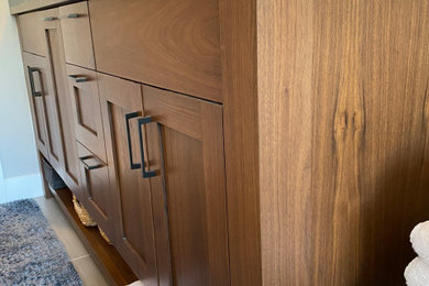 Custom Walnut Cabinetry for Vanity with Furniture Detailing and Shaker Doors