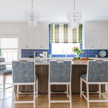 Vibrant Blue Tile Backsplash and Custom Island Seating in a Houston Kitchen Remo