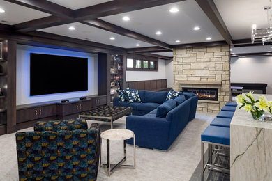 Design ideas for an expansive transitional look-out basement in Omaha with white walls, carpet, a two-sided fireplace, a stone fireplace surround, grey floor and coffered.