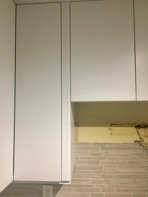 HELP - kitchen cabinet installer used crazy fillers?!?