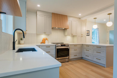 Example of a 1960s kitchen design in Other