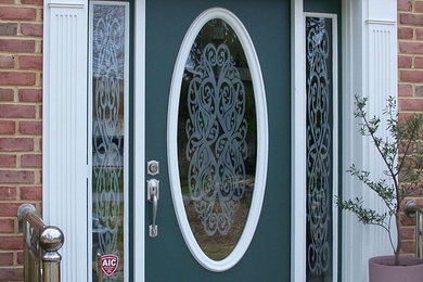 This is an example of a modern front door in New York with a single front door.