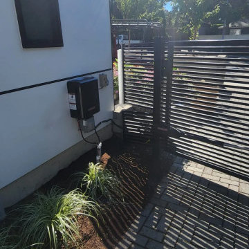 Modern dual swing gate installation in Kirkland, WA