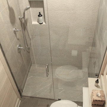 Tiled Guest Bathroom - Tile, Linear Drain, and Installation by Exact Tile Inc