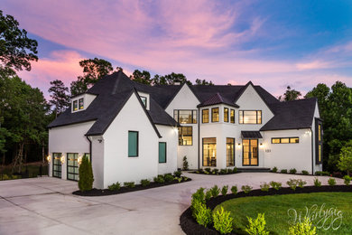 Photo of a contemporary home design in Charlotte.