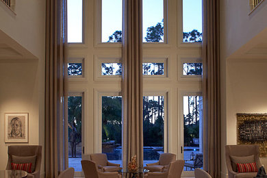 Living room - huge contemporary formal and open concept marble floor living room idea in Miami with beige walls, no fireplace and no tv
