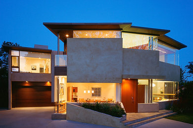 Inspiration for a contemporary two-story exterior home remodel in Los Angeles