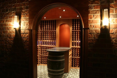 Example of a mountain style wine cellar design in Vancouver