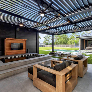 Residential: Attached Black Motorized Louvered Pergola in Friendswood, TX