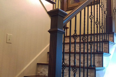 Example of a mid-sized classic wooden l-shaped staircase design in Houston with tile risers