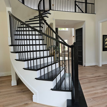 Project #130 | Curved Staircase with Wraparound Balcony