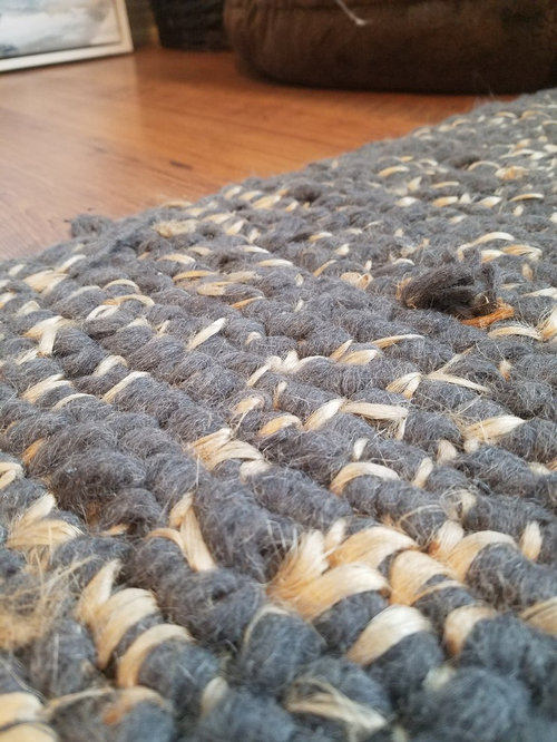 Wool rug normal or damaged?