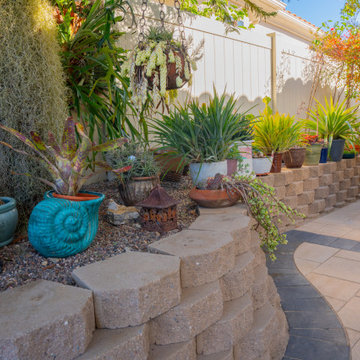 Elegant Outdoor Transformation with Retaining Wall & Paver Design