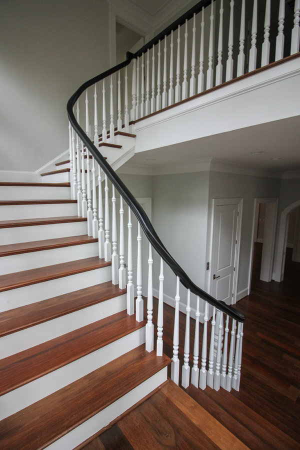 Powerful Impression by Floating Staircase in Suburban Foyer