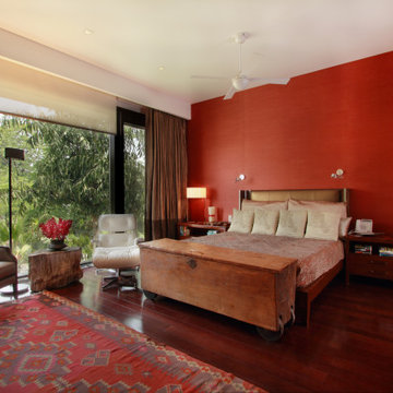 The Master Bedroom, with 'The Eames Lounge Chair' and an old Balinese trunk.