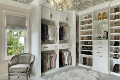 Example of a large transitional women's carpeted, wallpaper ceiling and gray floor walk-in closet design in St Louis with white cabinets and open cabinets