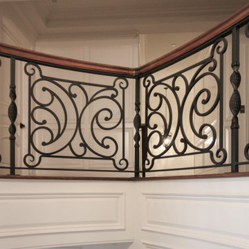 Project #74 | Circular Staircase with Hand-Forged Metal Panels