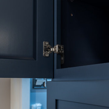 Modern Transitional Kitchen with Navy Blue Cabinets by The Cabination