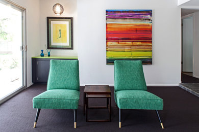 Example of a mid-sized 1960s formal and open concept carpeted living room design in Phoenix with a standard fireplace, a brick fireplace, white walls and no tv