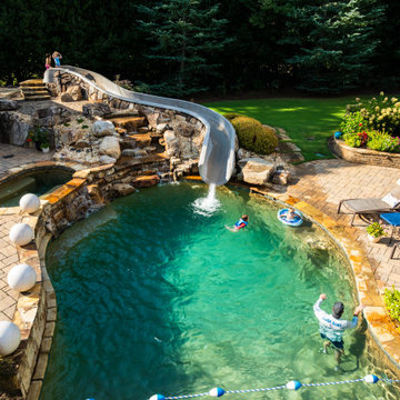 Resort-Style Natural Pool with Water Slide & Rock Waterfall