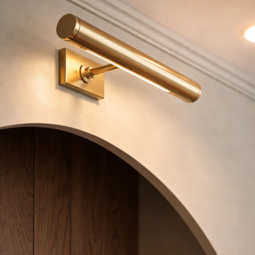 Custom Arched Built-In Cabinets with Gallery Lighting | Jacksonville Living Room