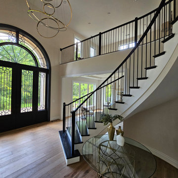 Project #130 | Curved Staircase with Wraparound Balcony