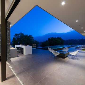Benedict Canyon Beverly Hills luxury modern home backyard pool terrace with slid