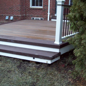 TREX TRANSCENDS SPICED RUM WITH VINTAGE LANTERN BORDER & WHITE TREX RAILING
