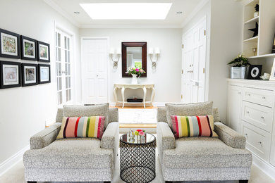 Example of a mid-sized transitional open concept carpeted living room design in Vancouver with gray walls, a standard fireplace, a stone fireplace and a media wall
