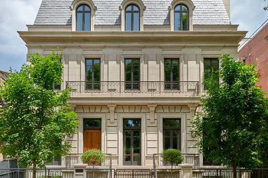 Inspiration for a huge timeless gray three-story stone exterior home remodel in Chicago with a shingle roof