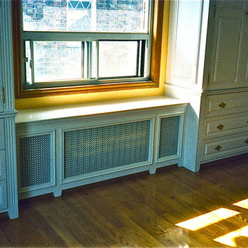 Built-in bedroom armoires and rad cover