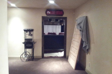 Home theater - traditional home theater idea in Denver