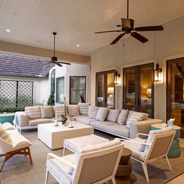 Rectangular pool, covered patio and kitchen, outdoor shower, landscaping