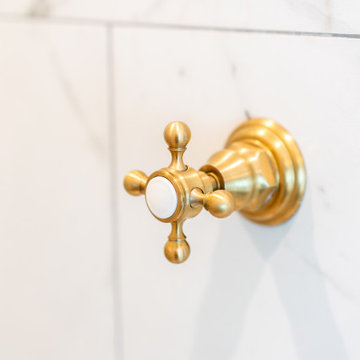 Classic Brass Shower Valve on Honed Marble Wall