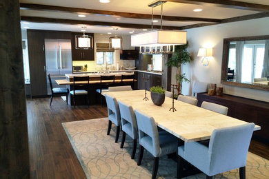 Great room - mid-sized transitional dark wood floor and brown floor great room idea in Denver with gray walls and no fireplace