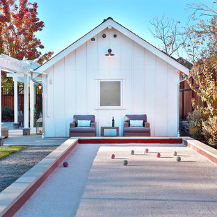 Design ideas for a mid-sized country backyard partial sun outdoor sport court for fall in Denver.