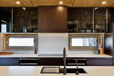 Kitchen splash back with textured concrete look