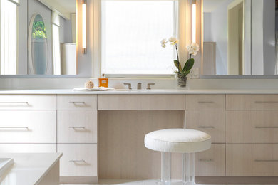 Inspiration for a mid-sized contemporary master marble floor bathroom remodel in Providence with flat-panel cabinets, light wood cabinets, blue walls, an undermount sink and marble countertops