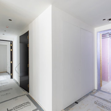 The minimalist finish of the wall access panels.